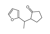 2-[1-(furan-2-yl)ethyl]cyclopentan-1-one Structure
